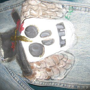 kids hand painted jeans, in the style of ed hardy,
